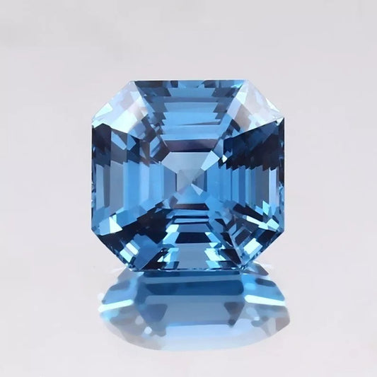 Swiss Blue Topaz gemstone with a clear background