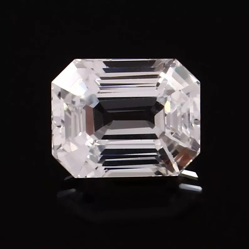 emerald -cut White Sapphire on a black background