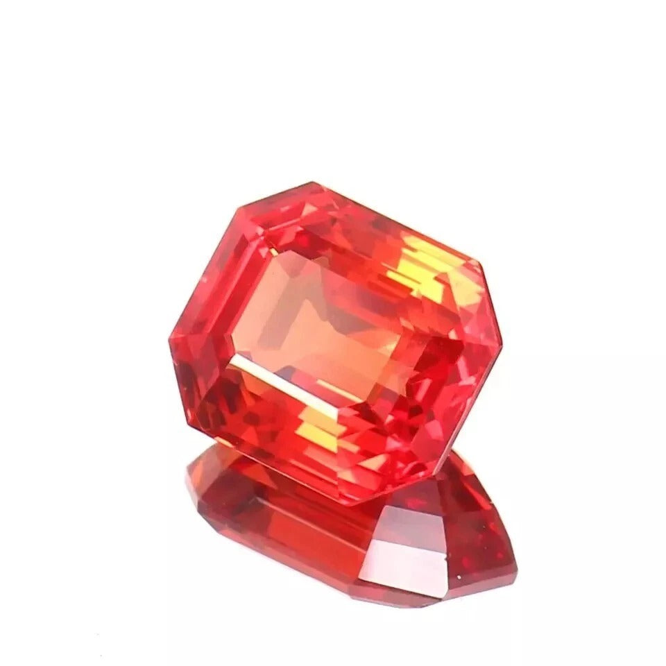Fanta Orange Sapphire gem on a white background