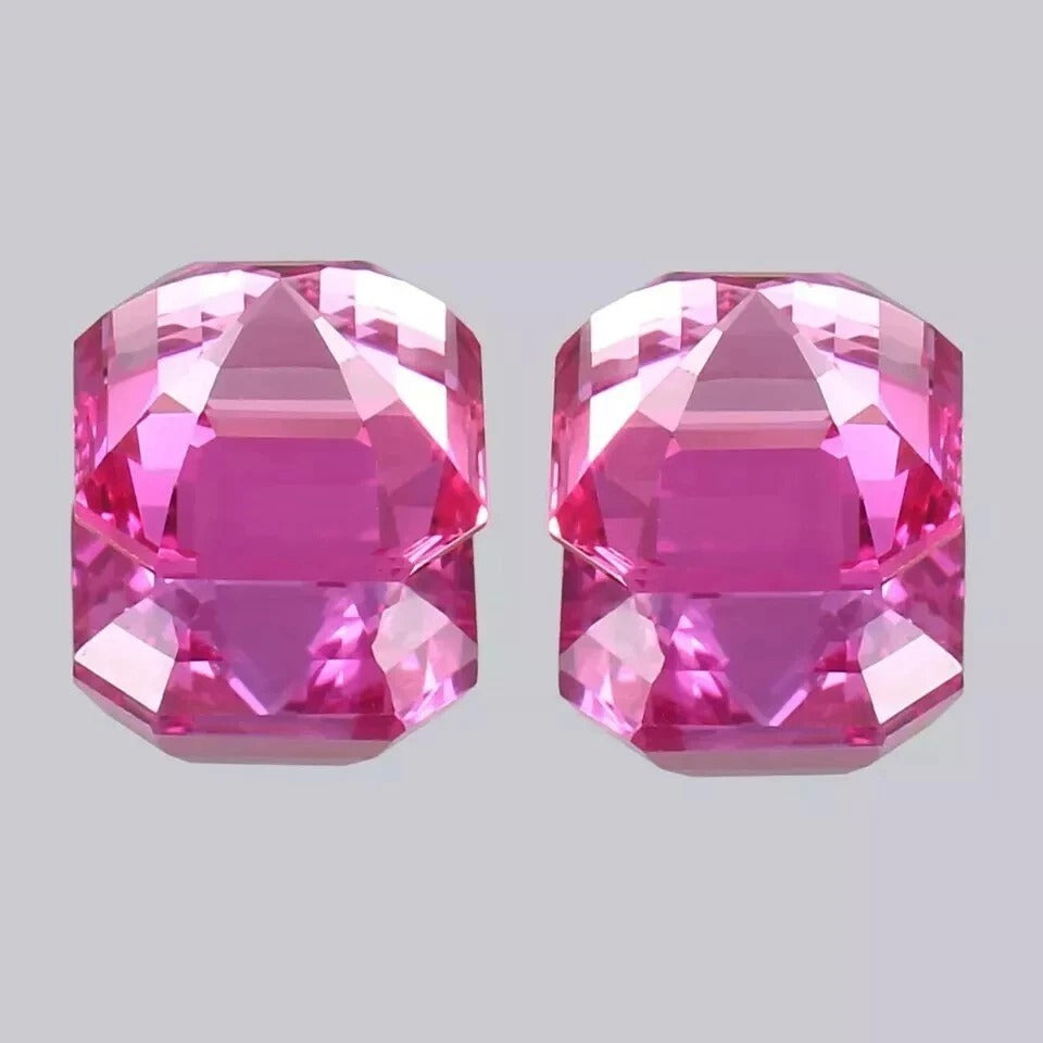 Ceylon Pink Sapphire pair gemstones on a light gray background