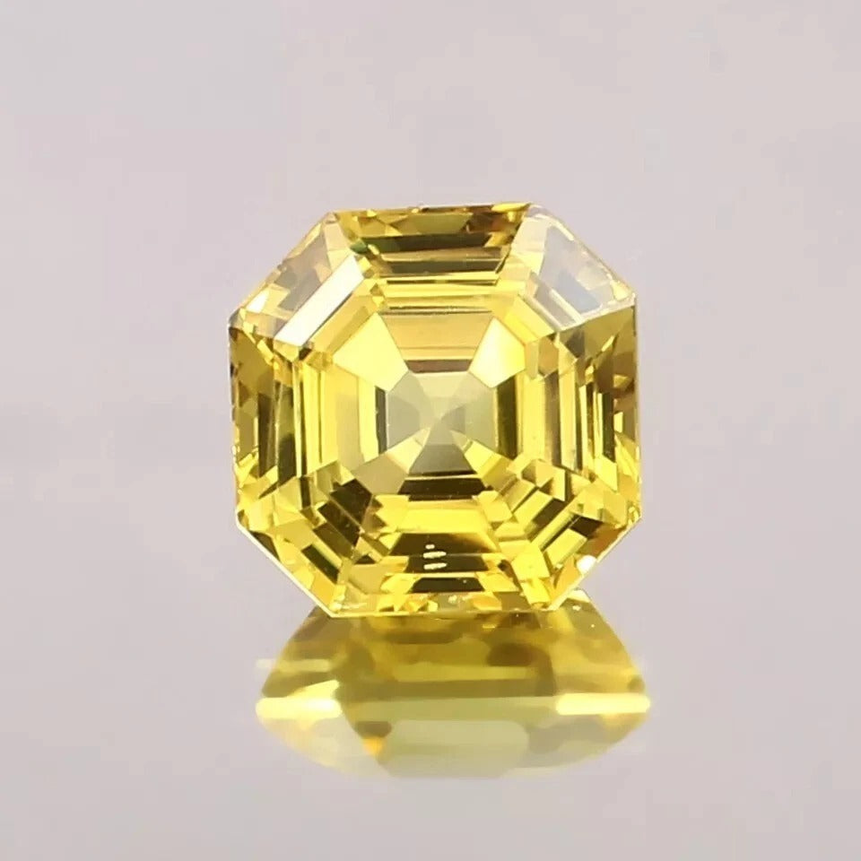 Yellow Sapphire gemstone with a clear background