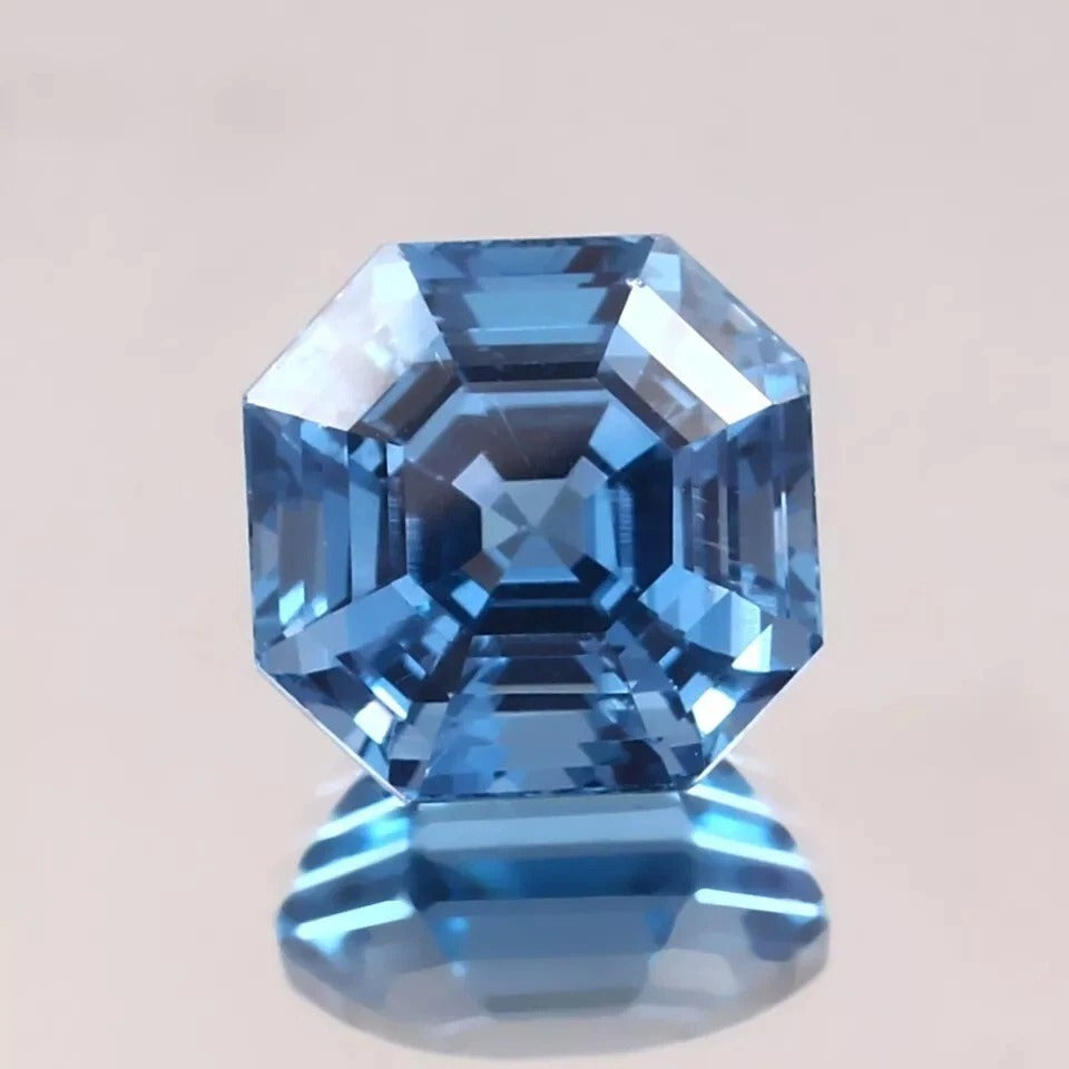 Blue Aquamarine gemstone with a clear background