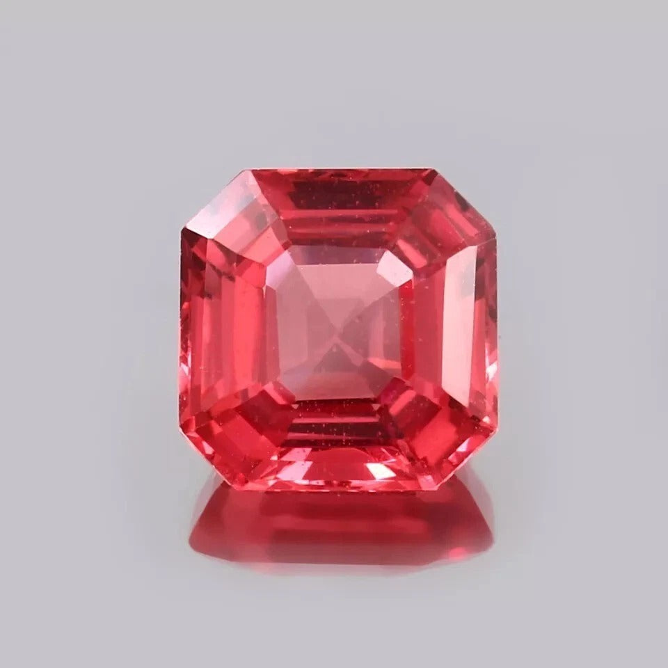 Solomon Color Untreated Padparadscha Sapphire gemstone with a clear background