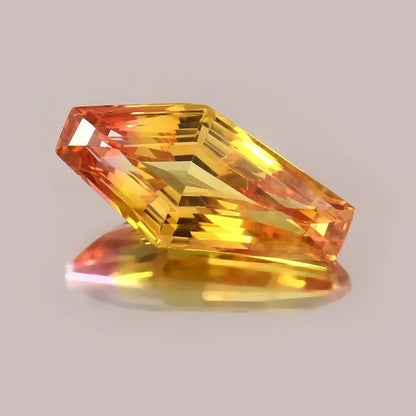 Multicolored Bi-Color Sapphire gemstone on a gray background