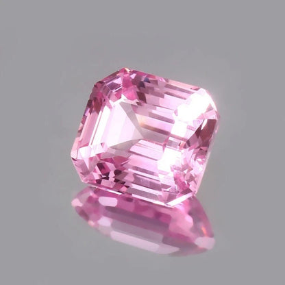 Pink Morganite Madagascar gemstone on a gray background