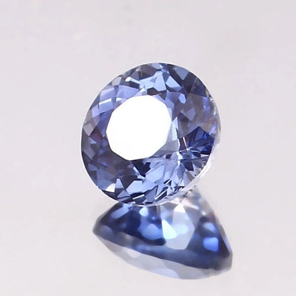 Paste Blue Color Sapphire gemstone on a light gray background