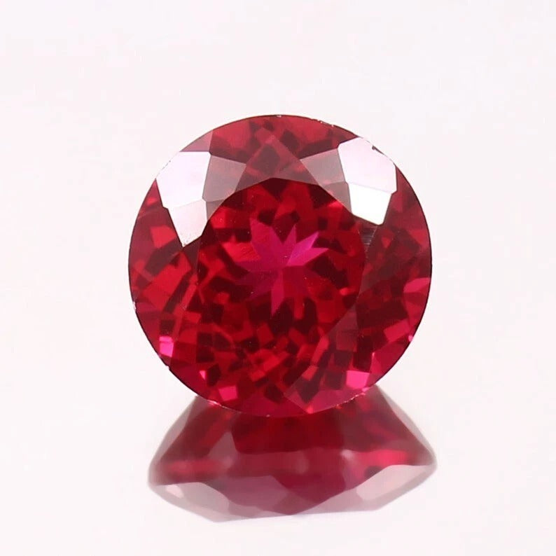 Rare Pigeon Red Ruby gemstone on a white background