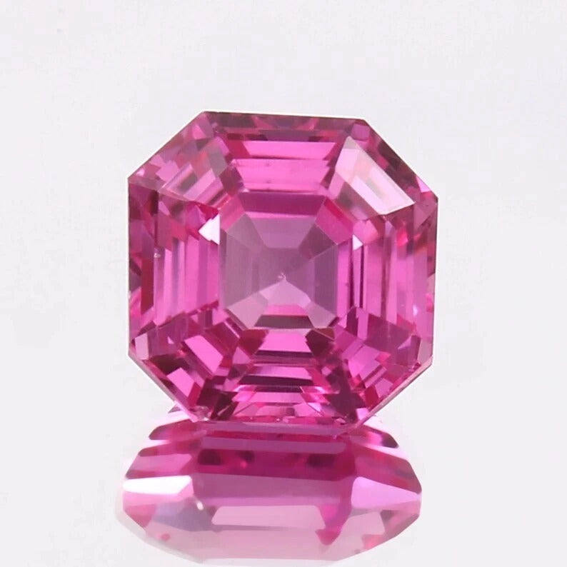 Pink Sapphire asscher gemstone with a clear background