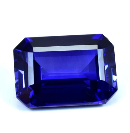 Faceted blue Sapphire gemstone on a white background