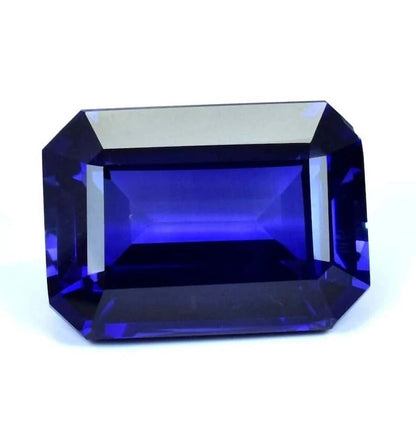 Faceted blue Sapphire gemstone on a white background