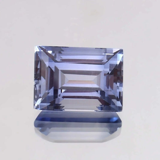 Ceylon Blue Sapphire – Baguette Cut blue gemstone on a light gray background