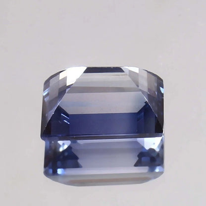 Ceylon Blue Sapphire – Baguette Cut gemstone on a light gray background