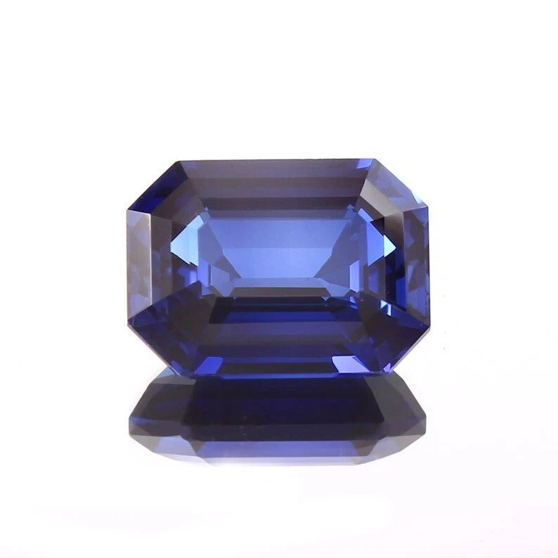 Ceylon Blue Sapphire gemstone with a rectangular cut on a white background