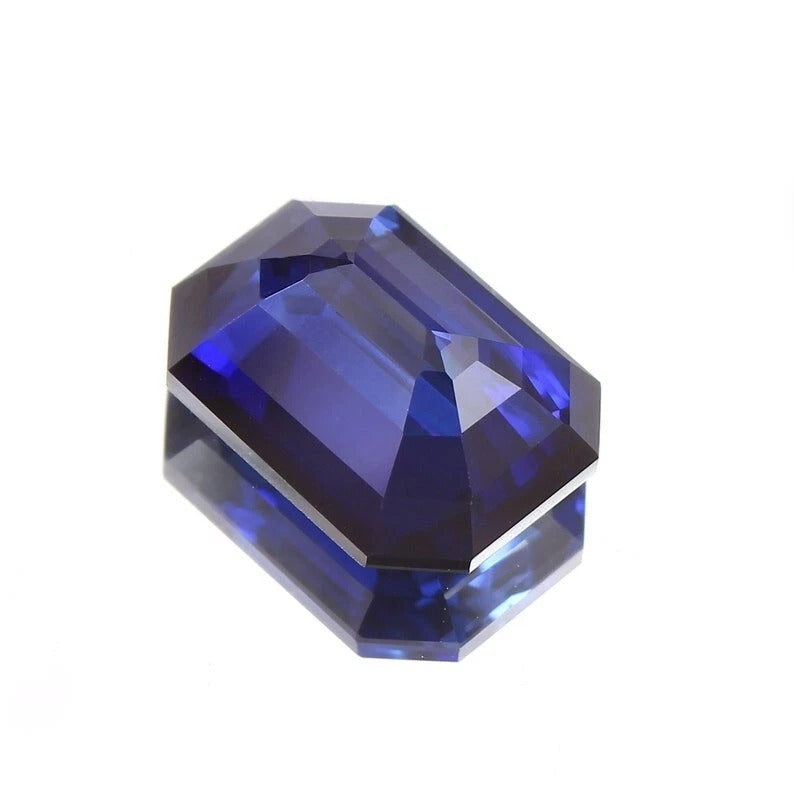 Faceted Ceylon Blue Sapphire gemstone on a white background