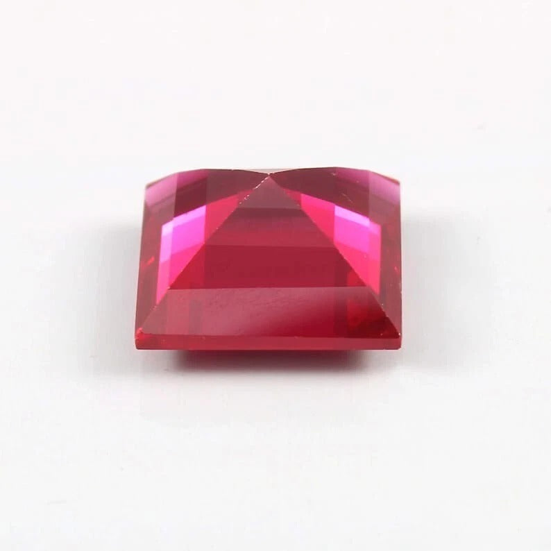 Red Mozambique Ruby gemstone on a white background