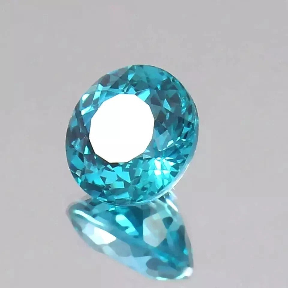 Parti Sapphire gemstone on a gray background