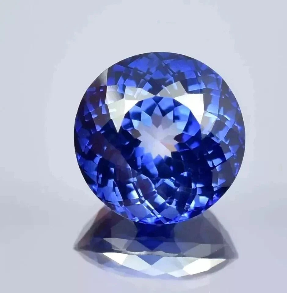 Royal Blue Sapphire blue gemstone on a light gray background