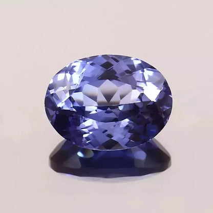 Blue Sapphire gemstone on a light beige background