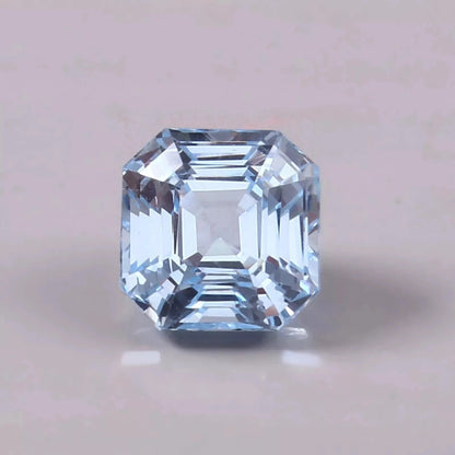 Clear Sky Blue Color Aquamarinegemstone on a light gray background