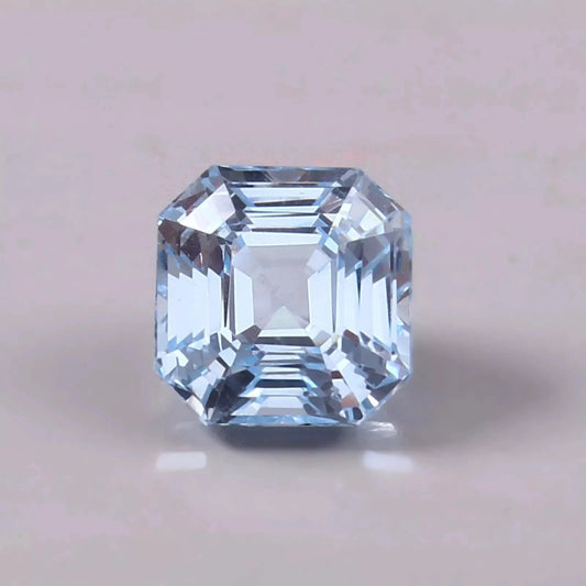 Clear Sky Blue Color Aquamarinegemstone on a light gray background