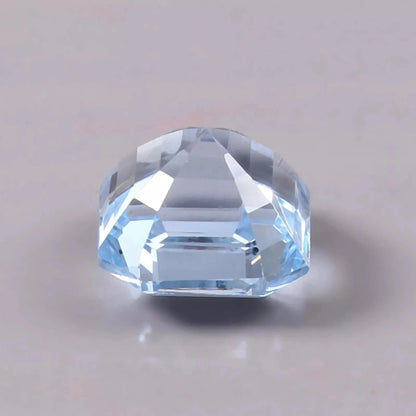 Sky Blue Color Aquamarine gemstone on a light gray background